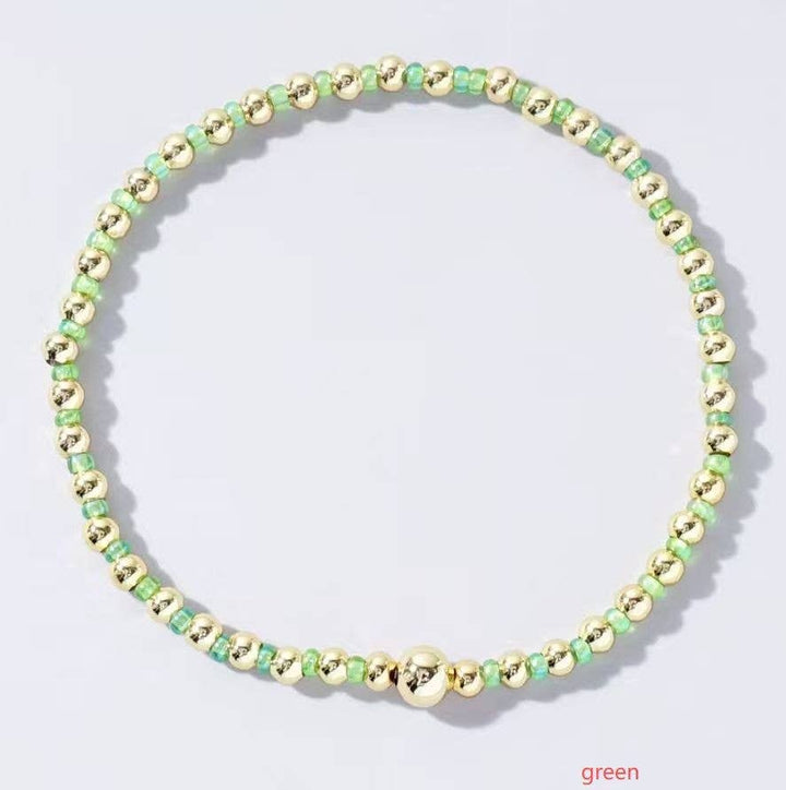 Boho Colored Bracelet with beads/gold ball