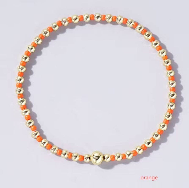 Boho Colored Bracelet with beads/gold ball