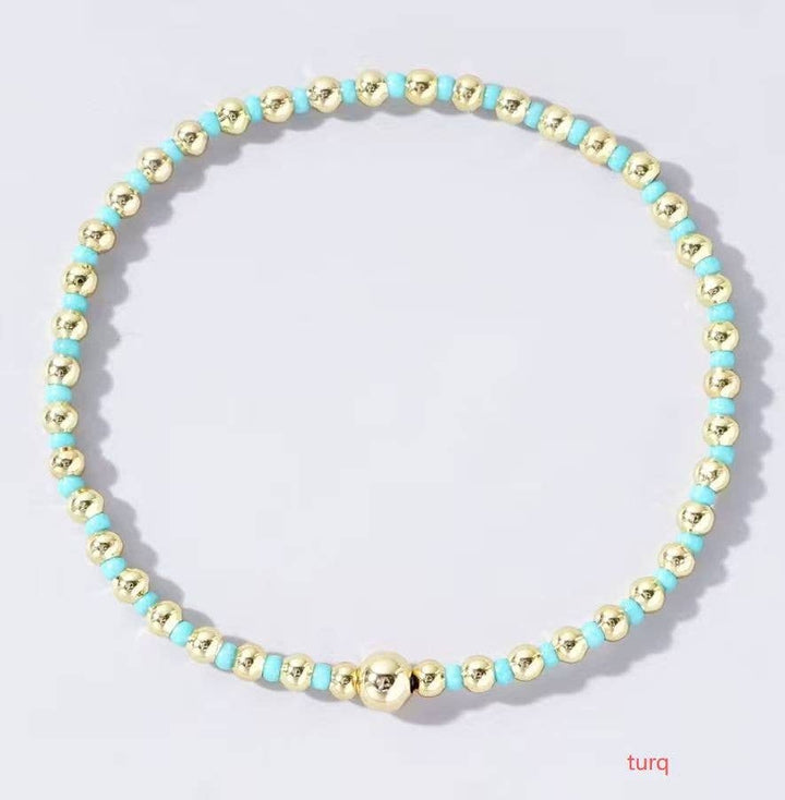 Boho Colored Bracelet with beads/gold ball