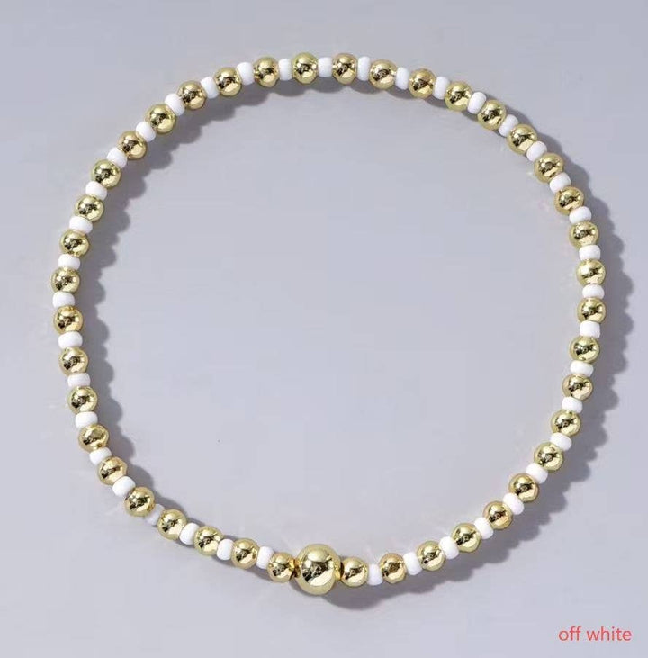 Boho Colored Bracelet with beads/gold ball