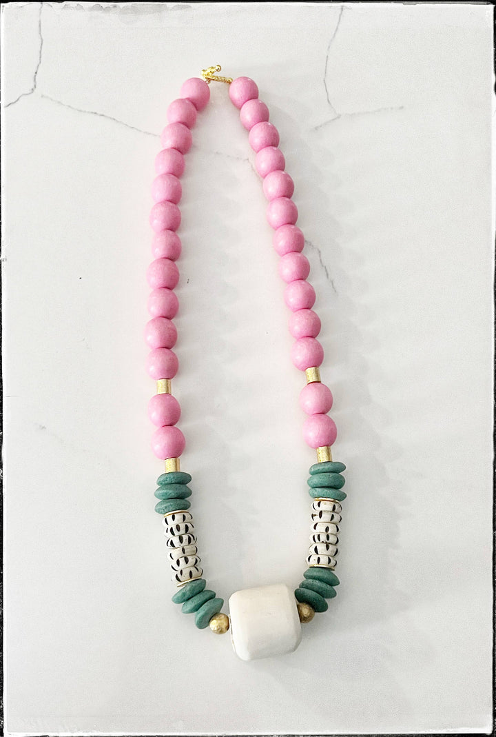 Pink Beaded necklace with green and other beads 