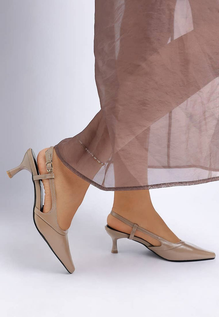 A Styled Collective beige faux leather kitten heel slingbacks with a snip toe and adjustable buckle strap.