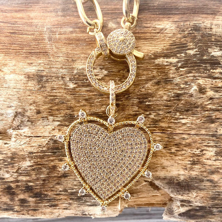 Gold sparkly heart statement necklace