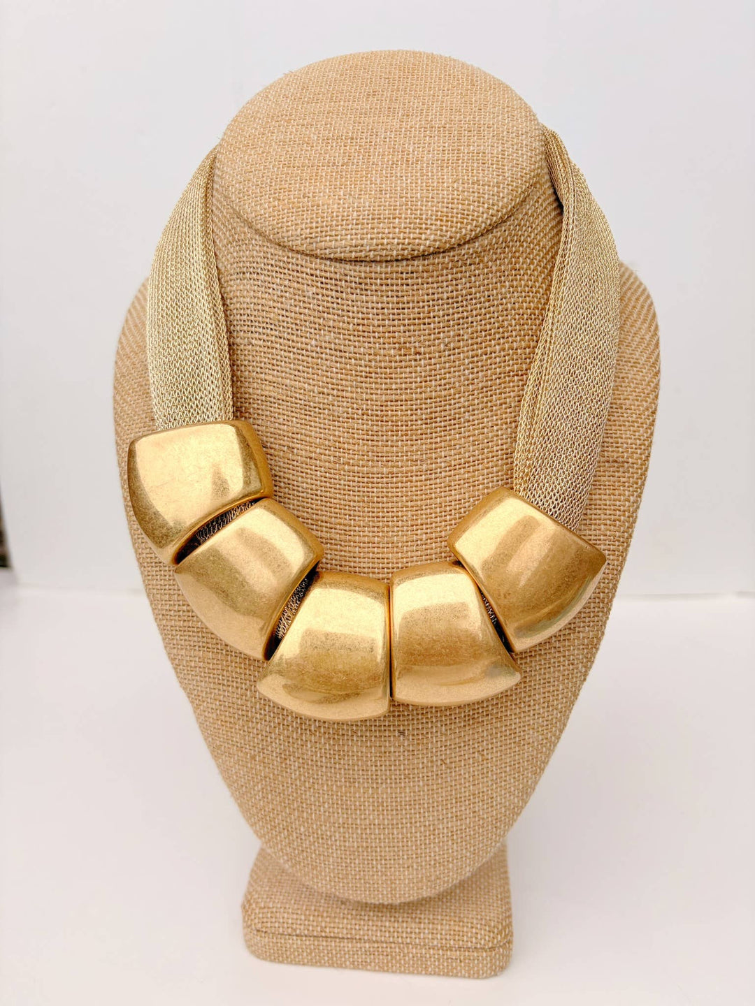 gold mesh necklace with large gold beads 